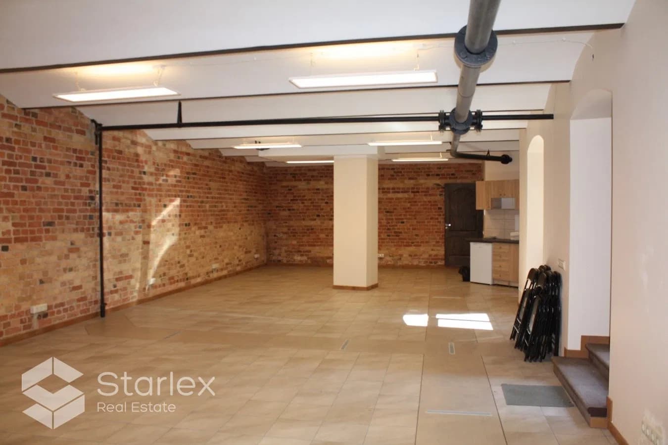 An office with exposed brick walls 2