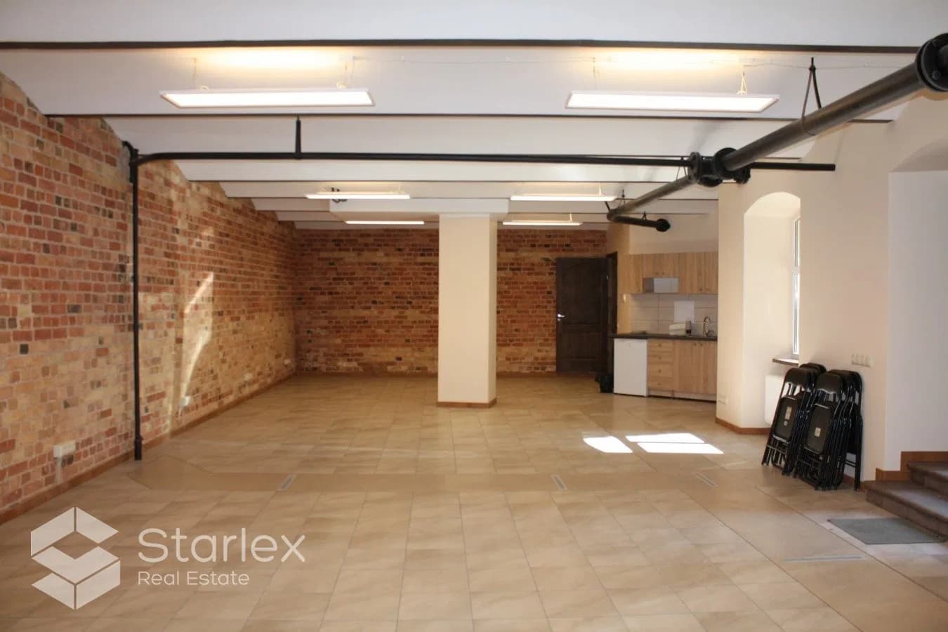 An office with exposed brick walls 3