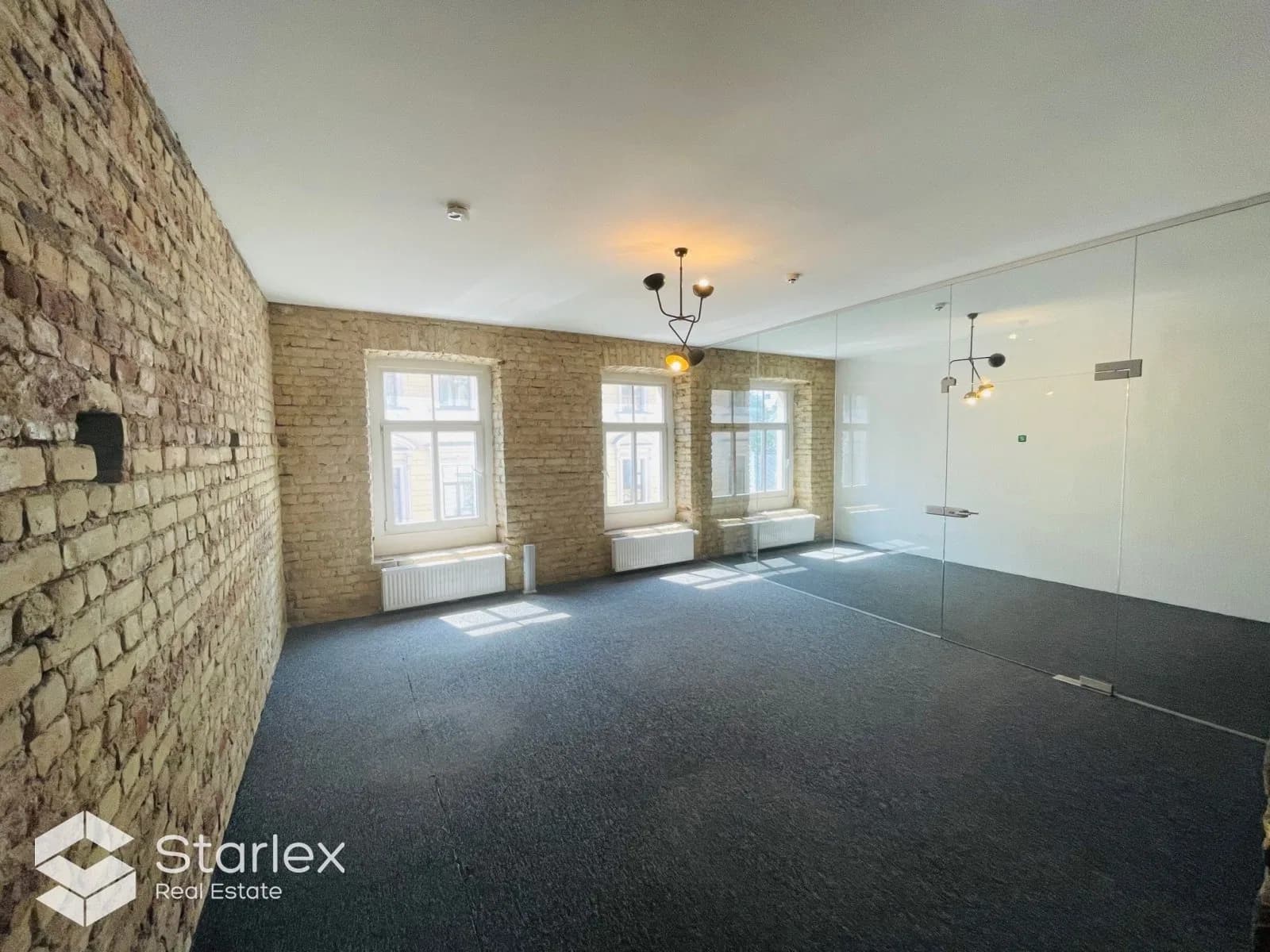 Office with exposed brick walls in the center of Riga 2