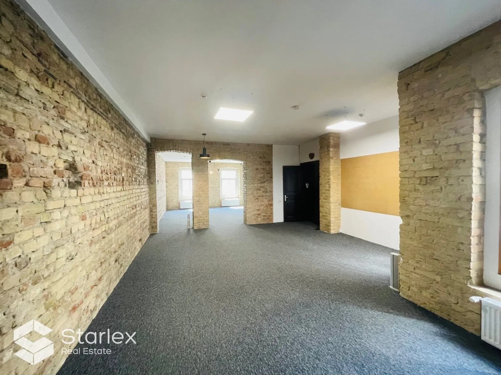 Office with exposed brick walls in the center of Riga 3