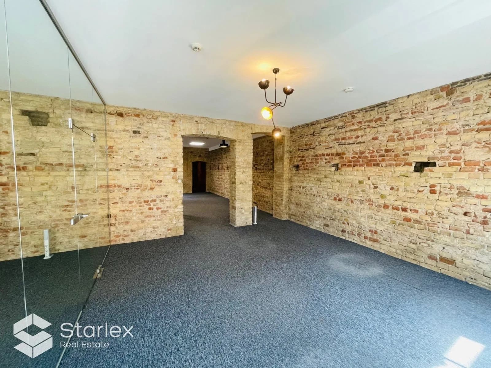 Office with exposed brick walls in the center of Riga 5